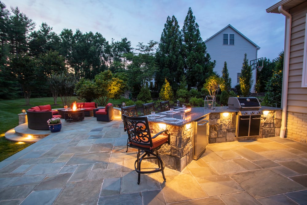 Amazing Patio with an Outdoor Kitchen and Seating Area with Lights